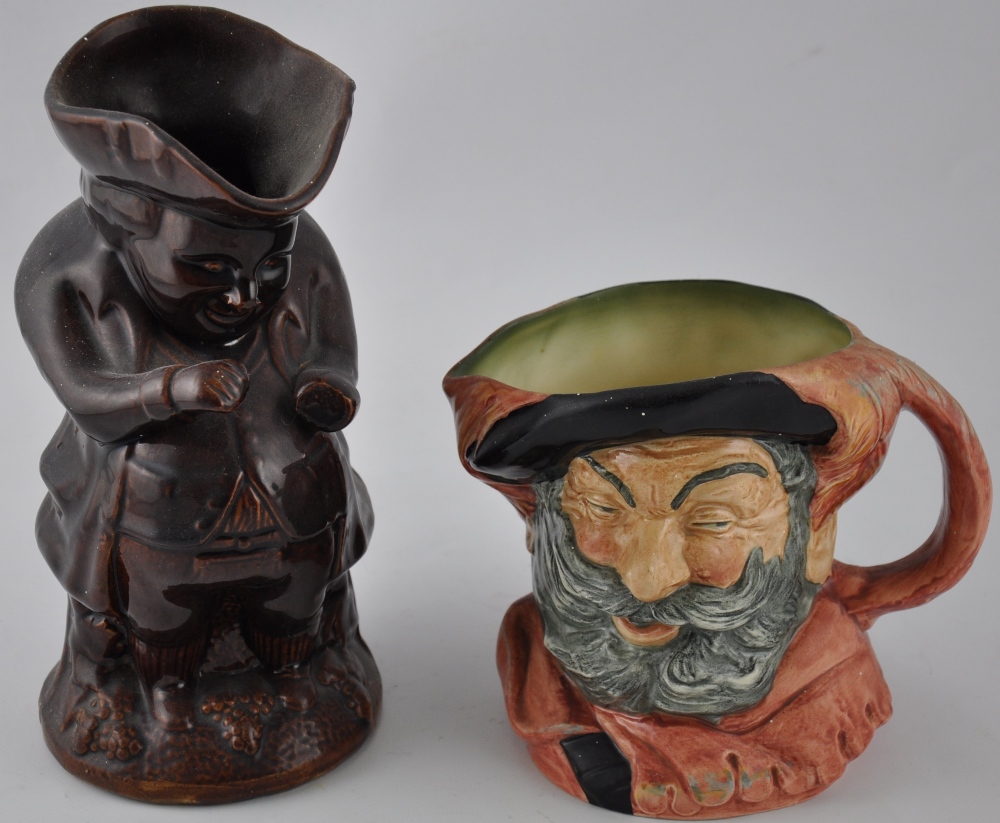 A Royal Doulton character jug, Falstaff, H. 15cm, together with a 19th century treacle glazed