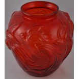 **WITHDRAWN** A large red moulded glass vase, depicting martletts in flight, H. 28cm.