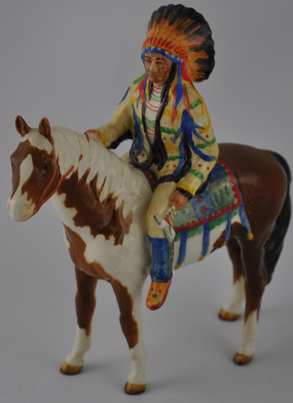 A Beswick Indian Chief mounted on a Skewbald horse, model no. 1391 'The Mounted Indian' designed by