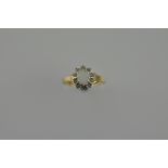 A 9ct gold opal and diamond dress ring, 2g.