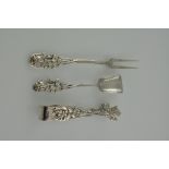 A pair of white metal sugar tongs, pierced and decorated with roses and beads, and stamped 800,