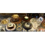 A collection of assorted ceramics, glass and wood ashtrays.