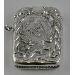 A Victorian style sterling silver vesta embossed masonic motifs, ribbon folds and scrolls, H. 6 cm