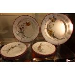 Twelve 19th Century French Sarreguemines Papillon pattern butterfly and floral hand-painted plates.