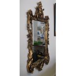A Chippendale style rectangular gilt frame wall mirror with pierced shell scroll frame.