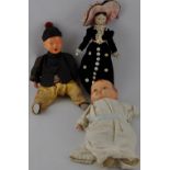 An early 19th century Chinese costume doll, the gentleman wearing a black silk bobble hat with