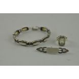 A white metal and mother-of-pearl bracelet, stamped 925; together with a similar ring and brooch.