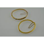 A 9ct gold bangle, with Chester mark, together with another bangle, total weight 12g.
