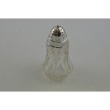 A silver mounted cut glass sugar sifter, Birmingham 1907, H. 12cm.