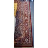 A Belgian Persian design wool carpet. 350cm x 250cm.