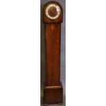 A walnut cased small longcase clock, the silvered chapter ring set out in Roman numerals and fitted