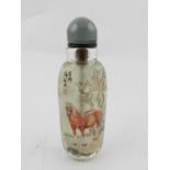 A Chinese glass snuff bottle, painted with horses
