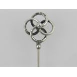 Charles Horner, Chester. A silver hat pin of interlaced quatrefoil form, hallmarked Chester 1905.