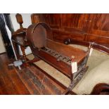 A late Victorian mahogany and stained beechwood rocking cradle. L.94cm