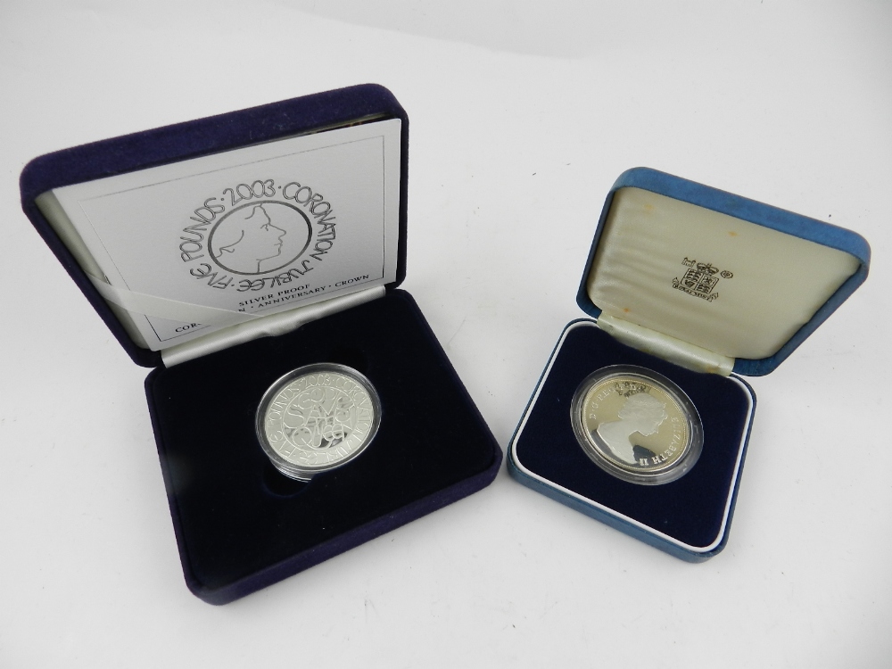 A Coronation Jubilee £5 2003 silver proofed coin, together with an other silver proofed coin,