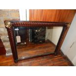 A George IV mahogany overmantle mirror, gilt metal mounted with rosettes, rectangular frame, parcel