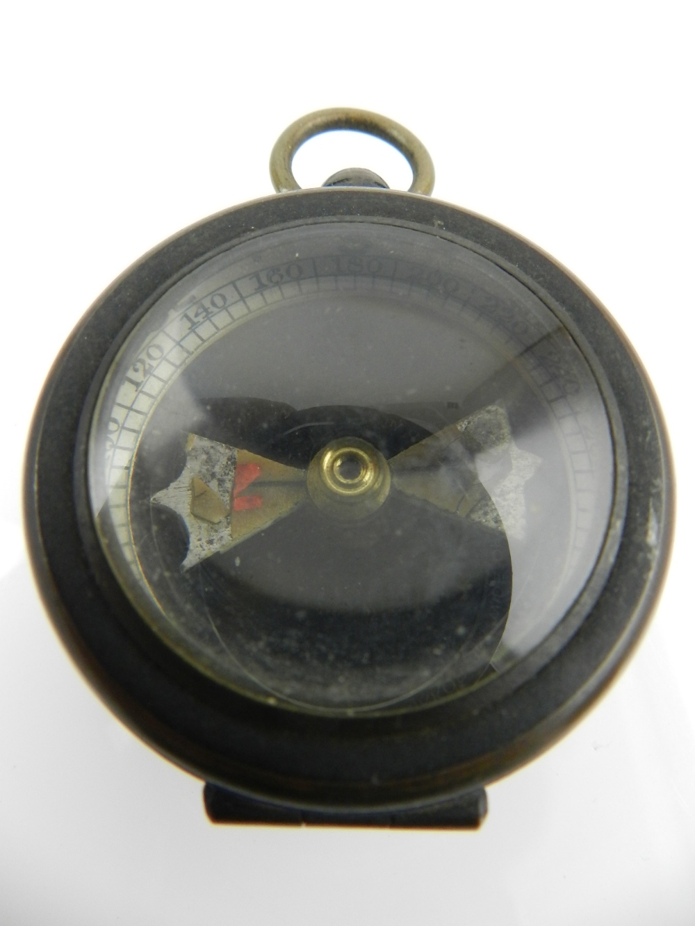 Francis Barker and Son, London. An early 20th century brass cased compass dated 1906.