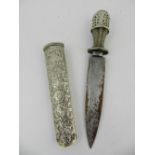 A Middle Eastern white metal dagger.