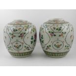 A pair of Chinese porcelain crackle glazed vases,decorated with vignettes of birds and flowers,