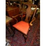 A set of 6 Queen Anne style oak dining chairs, two having arms.