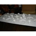 A Royal Doulton tumbling leaves, part dinner, coffee and tea service, to include six dinner plates,