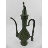An archaic style Chinese patinated bronze ewer, bears seal mark to base. H.25cm
