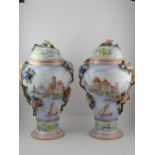 A pair of late 19th/ early 20th century Dresden porcelain inverted baluster vases and covers in the