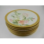 A Aynsley porcelain dessert service, painted with flowers to centre, having gilt rim.