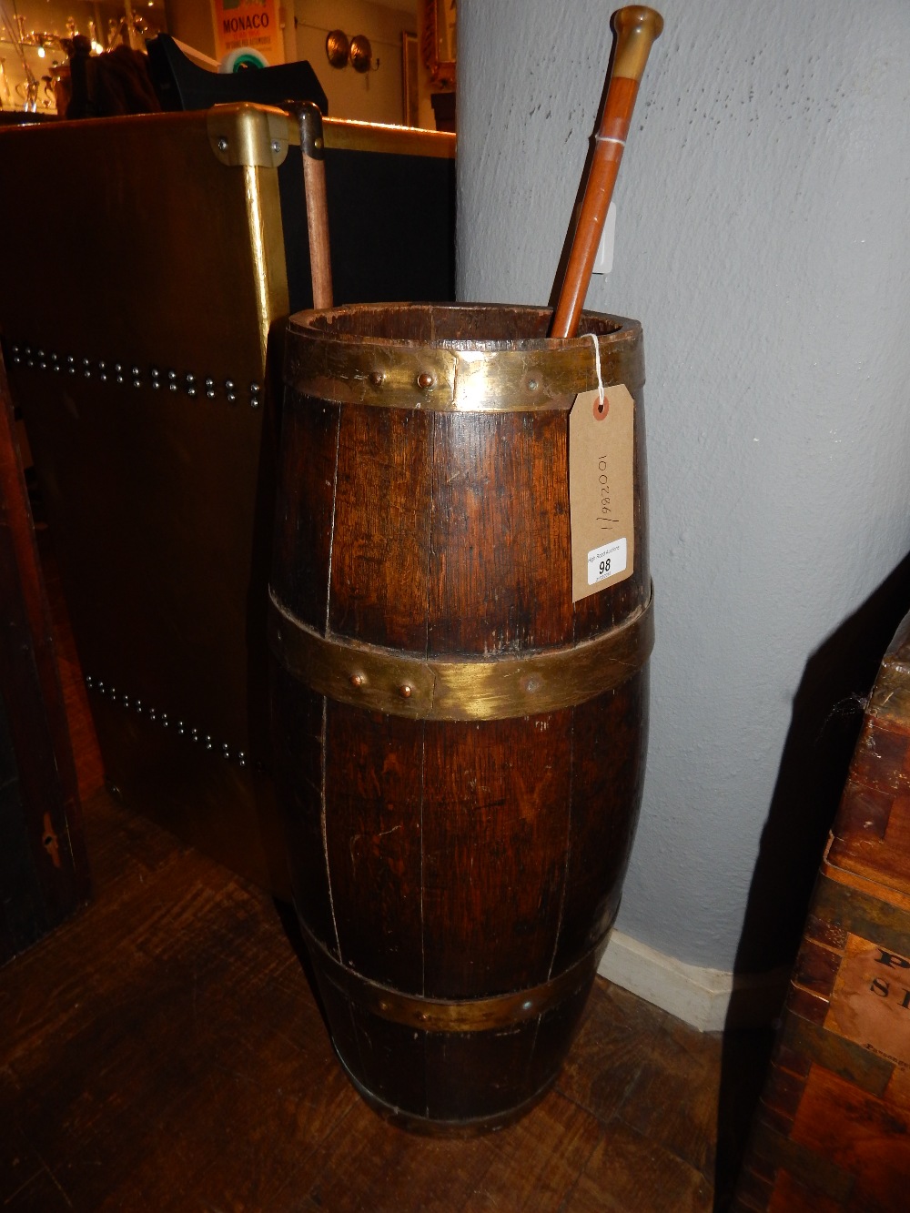 An early 20th century staved and coopered oak barrel stick stand. H.68cm