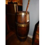 An early 20th century staved and coopered oak barrel stick stand. H.68cm