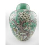 An early 20th century Canton famille verte pocelain ginger jar and cover, decorated with songbirds