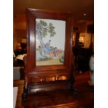 An early 20th century Chinese porcelain table screen, polychrome decorated with enamels, depicting