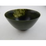 A Chinese spinach green jade bowl. H.6cm