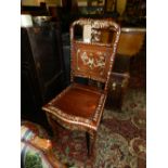 A Chinese carved paduak wood hall chair, inlaid with mother of pearl and abolone shell.