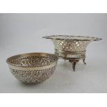 A Carrington & Co Edwardian reticulated silver bonbon dish, together with a white metal embossed