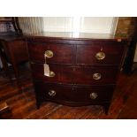 A late George III mahogany bow fronted chest, fitted two short above two graduated long drawers on