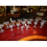 A suite of cut glass hobnail champagne cups, together with other hobnail cut glasses, various