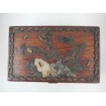 A Chinoiserie style wooden box, having moulded decoration of foliage and butterflies to top.