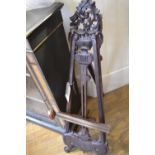 An 18th century style carved mahogany miniature artists easel. H.110cm