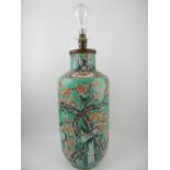 An early 20th century porcelain vase table lamp, decorated with a peony tree. H.40cm (base)