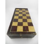 An early 20th century Canton school carved ivory chess set, having a  lacquered and gilt