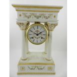 A Franklin mint bisk porcelain portico clock, in the Louis XVI syle, parcel gilded and painted with