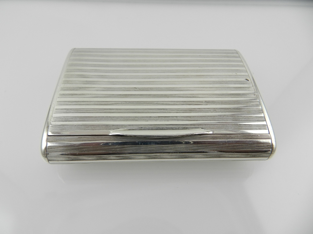 A 19th century silver snuff box, with engine turned decoration, hallmarked London 1921, makers mark