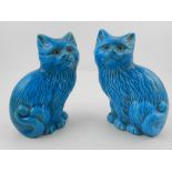 A pair of Chinese porcelain cats, turquoise glazed. H.13cm