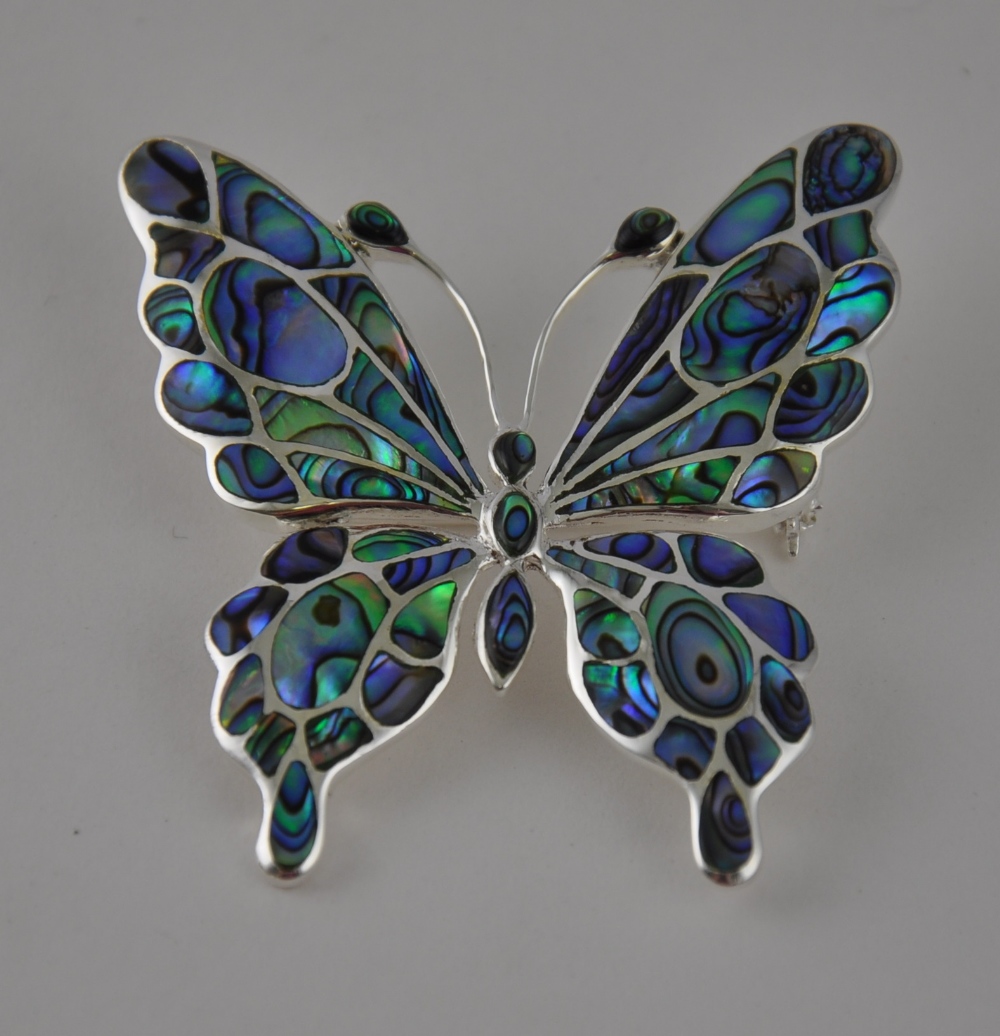 A silver and abalone butterfly brooch, L. 5cm.