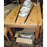 A Victorian style rectangular pine kitchen table fitted drawer on turned legs.