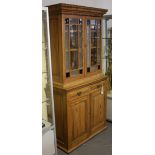 A late Victorian pitch pine bookcase,