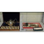 A cased part set of silver plated fish knives and forks, a plate mounted meat clamp,