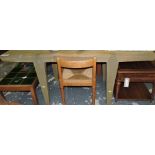 A designer pale oak console or dining table with rectangular top fitted drawer on square tapered