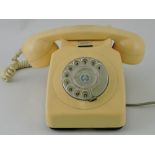An GPO cream 746F telephone, with On/Off button.